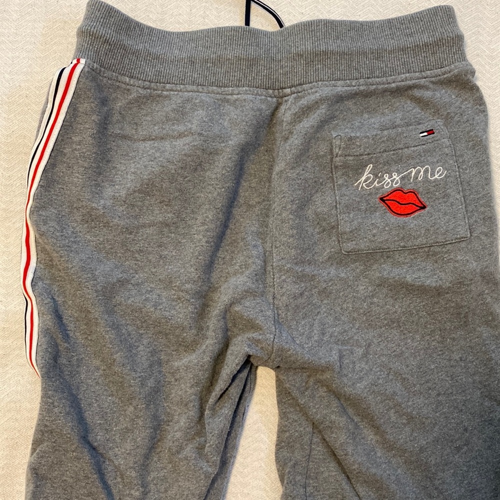 TH sweatpants. Lips on back pocket